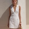 877fffa1-6938-4f56-aec3-6c492ada9315.jpg White Embroidered Mini Dress – Elegant Sleeveless Summer Dress